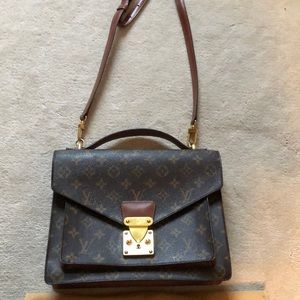 Authentic Louis Vuitton bag with leather strap